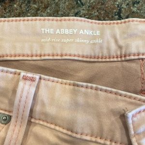 Gently worn AG Abby ankle jean. Blush color. Size 32.